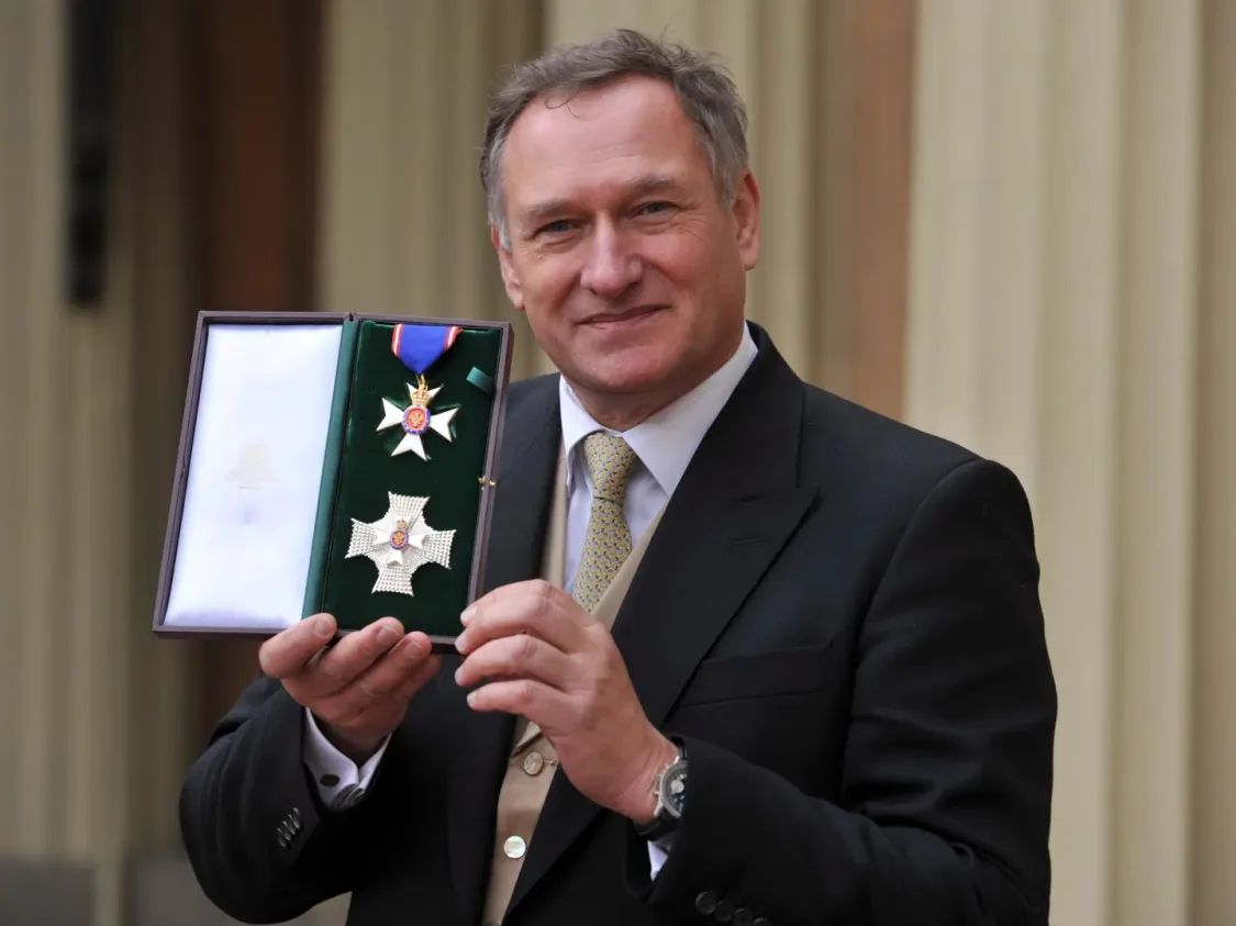 Sir Davisd with an award getty